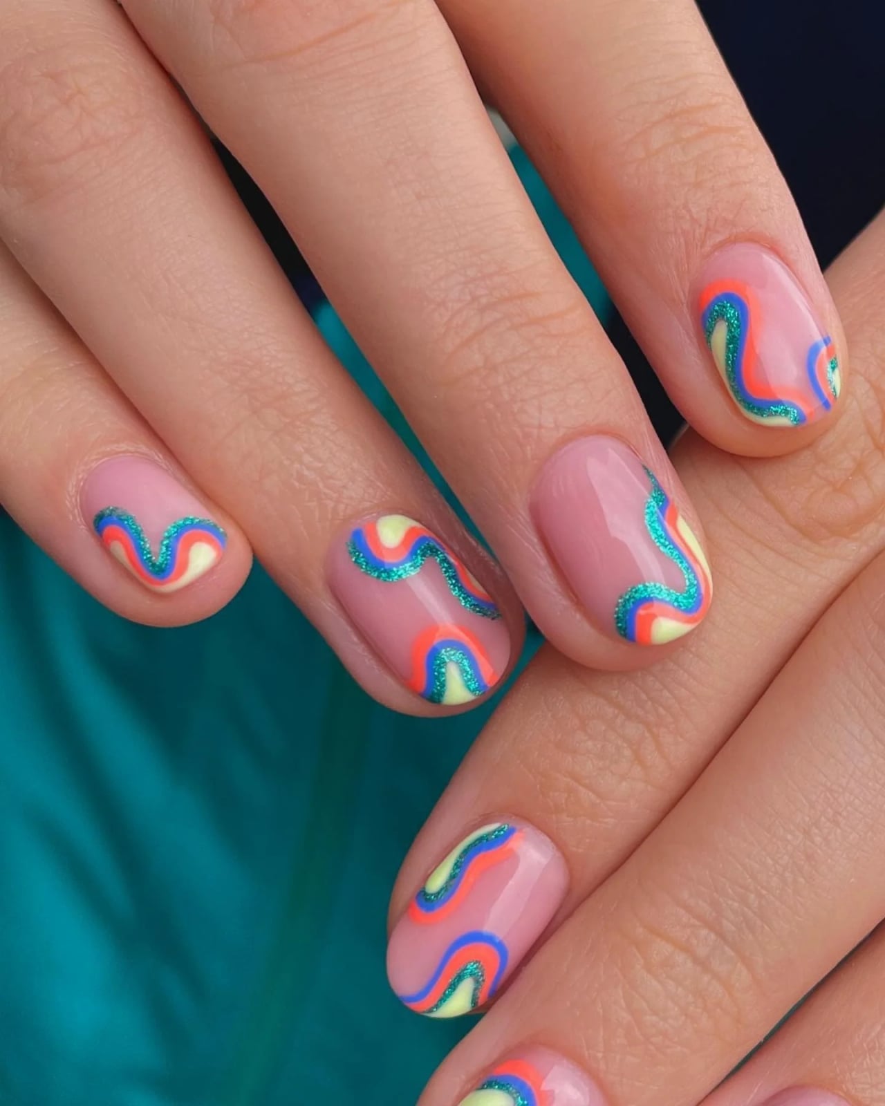 Short Oval Vibrant Swirl and Glitter Nails — Classy Swirl Nails
