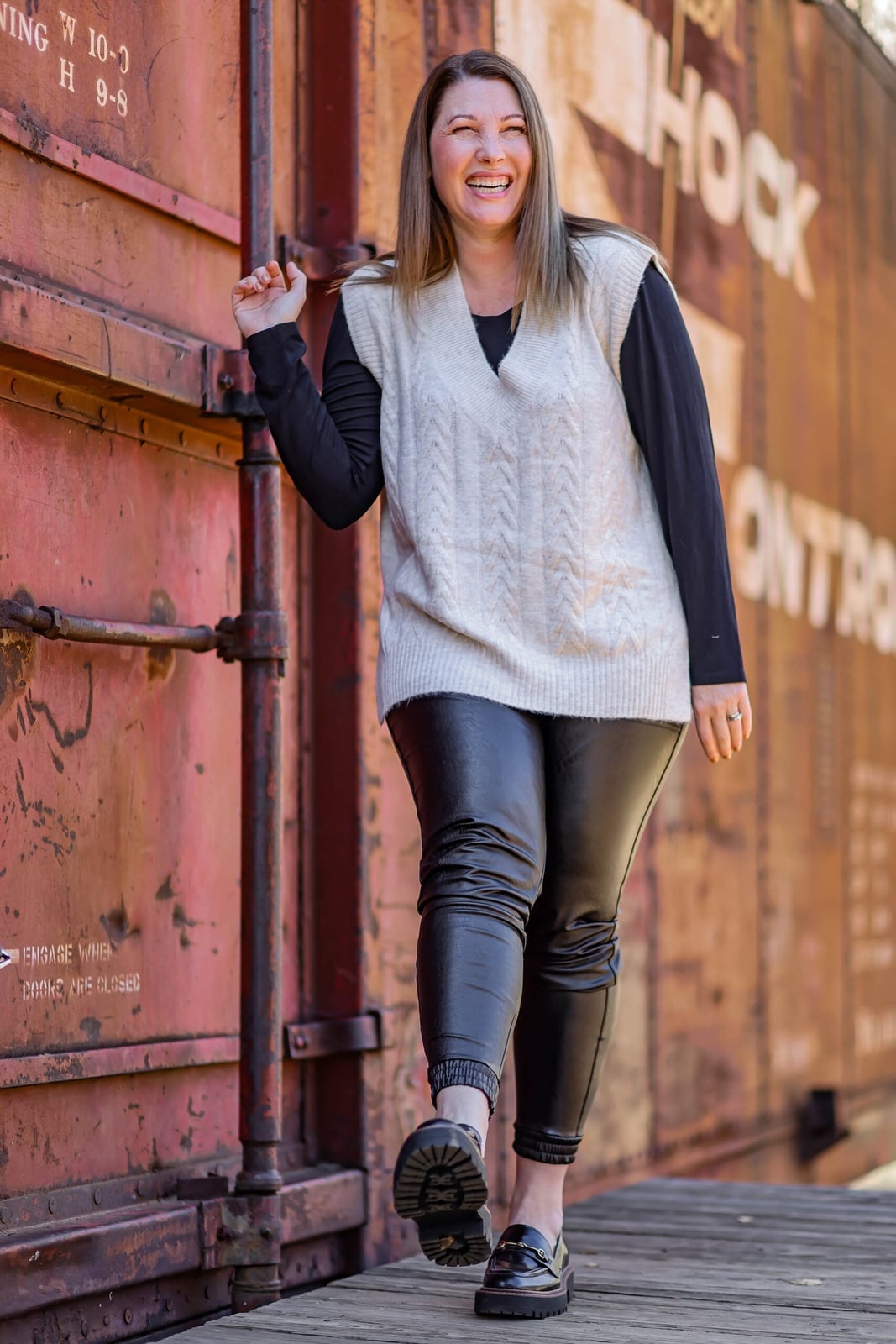 Sweater Vest Over Long Sleeve Top With Faux Leather Pants — Classy Teacher Outfits Elementary