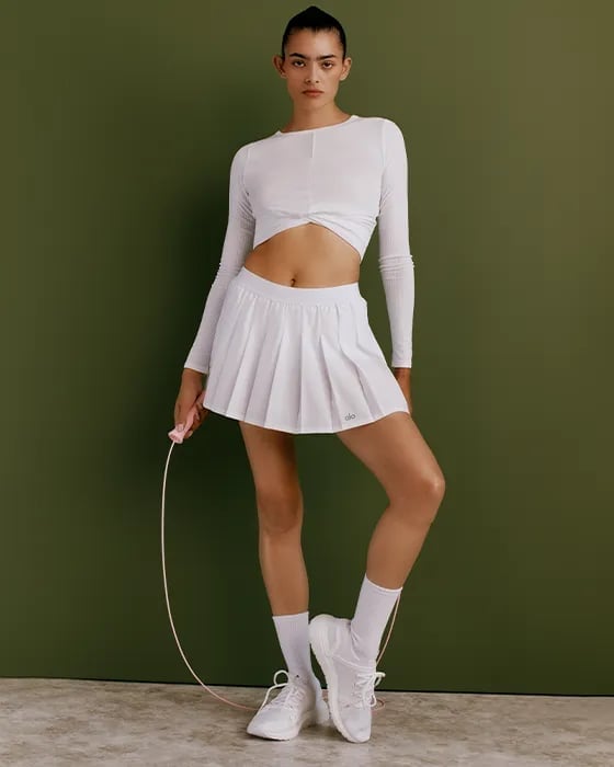 White Pleated Mini Skirt With Ribbed Crop Top, Close-Up Take White Pleated Mini Skirt With Ribbed Crop Top, Close-Up Take — Classy Tennis Skirt Outfits