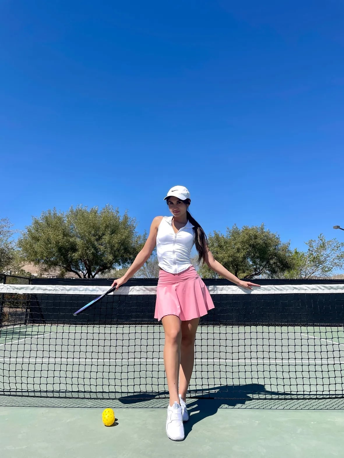 Pink Pleated Mini Skirt With Halter Top, White Baseball Cap Pink Pleated Mini Skirt With Halter Top, White Baseball Cap — Classy Tennis Skirt Outfits