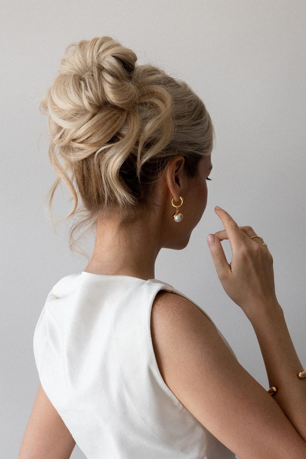 Soft Braided Updo With Loose Tendrils — Classy Wedding Guest Updos