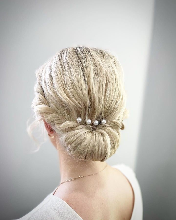 Blonde Updo With Braided Accents — Classy Wedding Guest Updos