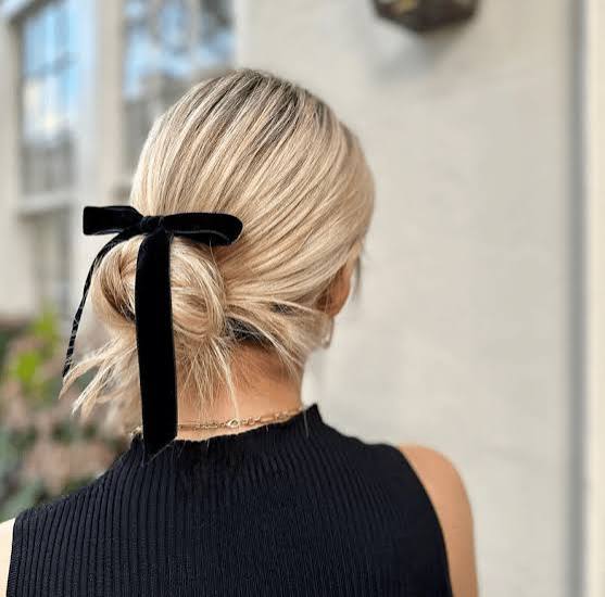 Light Blonde Low Bun With Ribbon — Classy Wedding Guest Updos