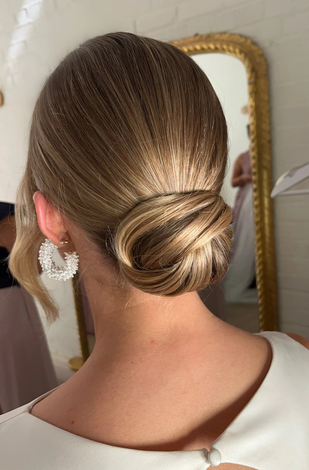 Honey Blonde Sleek Bun Back View — Classy Wedding Guest Updos