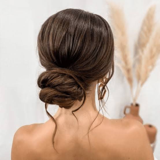 Twisted Dark Brown Low Bun — Classy Wedding Guest Updos