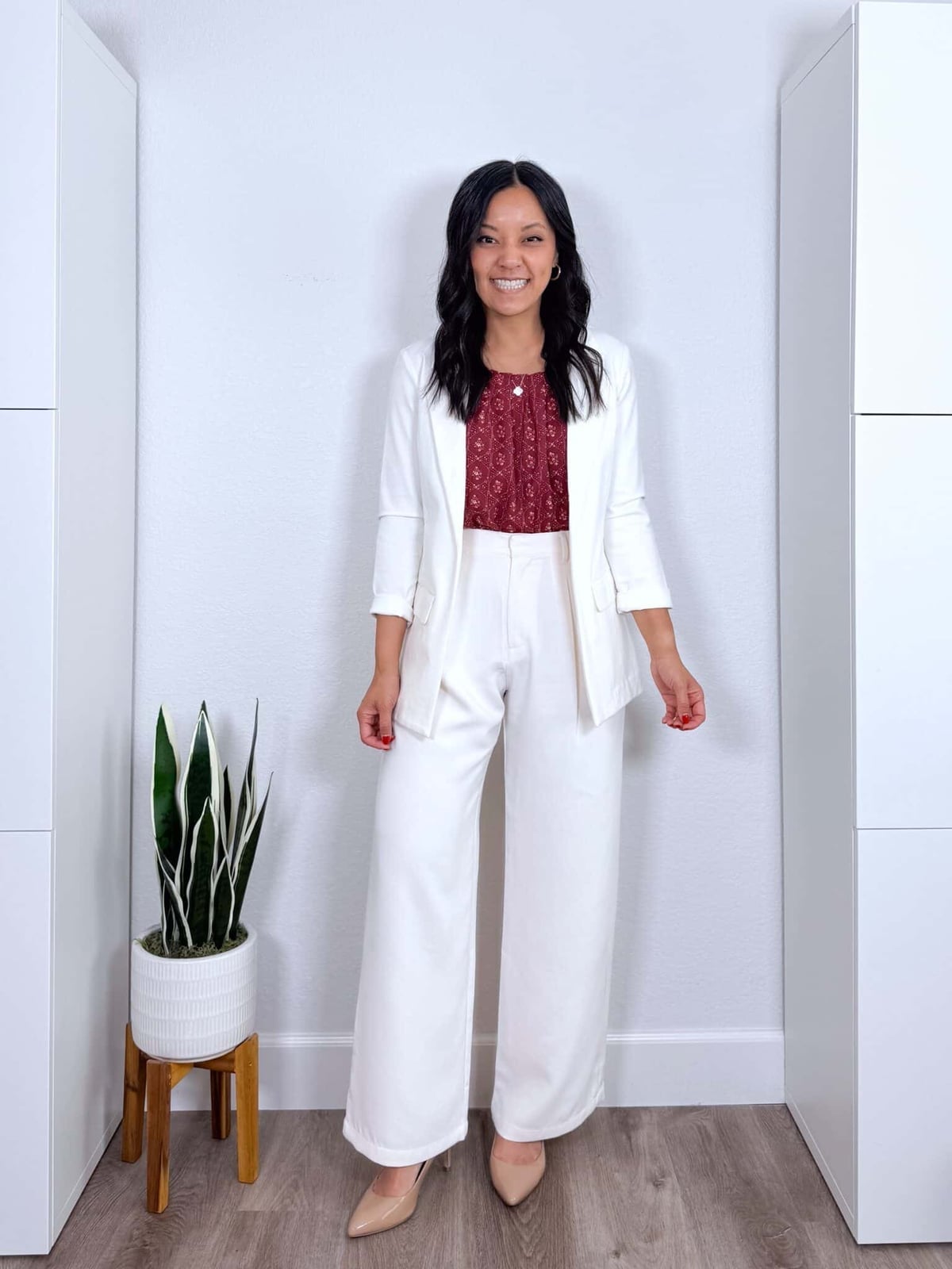 White blazer with maroon top and white wide-leg trousers — Classy Work Outfits