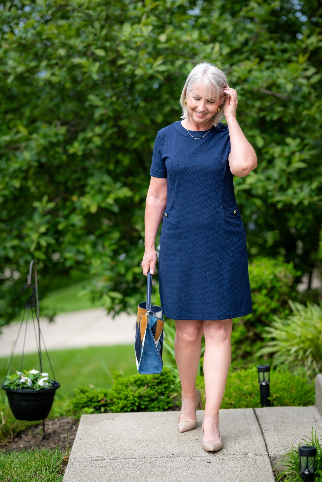 Textured navy sheath dress with nude pumps — Classy Work Outfits