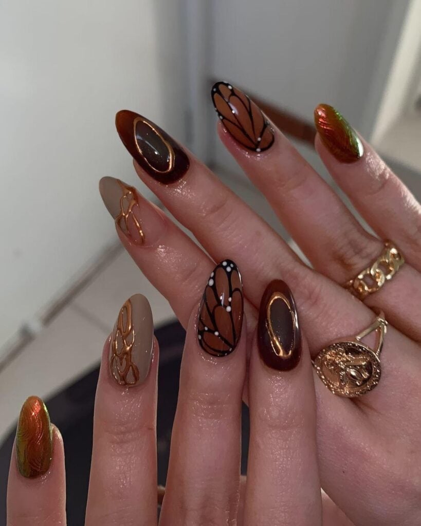 Long Almond Metallic Butterfly Wing Nails Long Almond Metallic Butterfly Wing Nails — Cute Brown Nails
