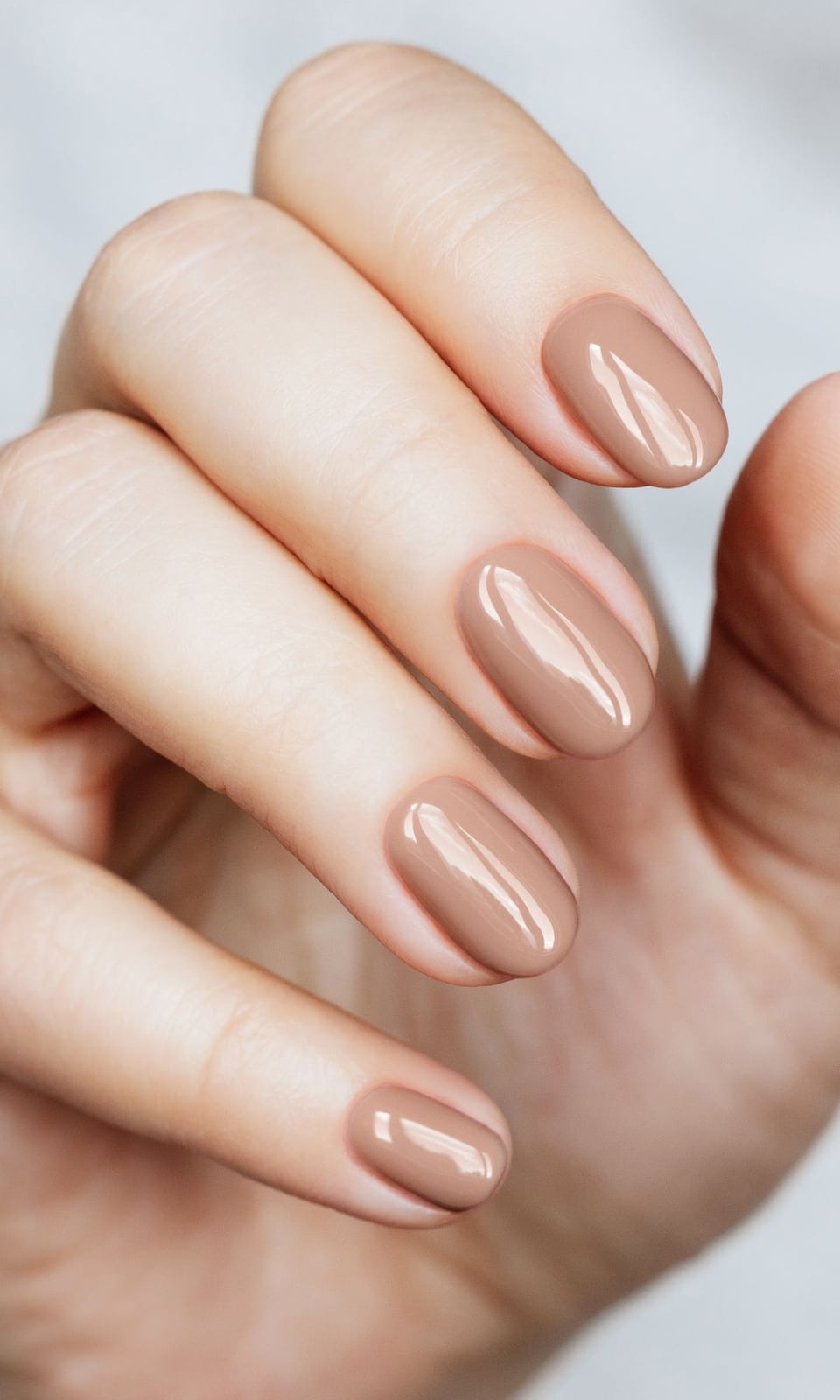 Medium Tan Solid Short Oval Glossy Nails, Close-Up Take — Cute Tan Nails