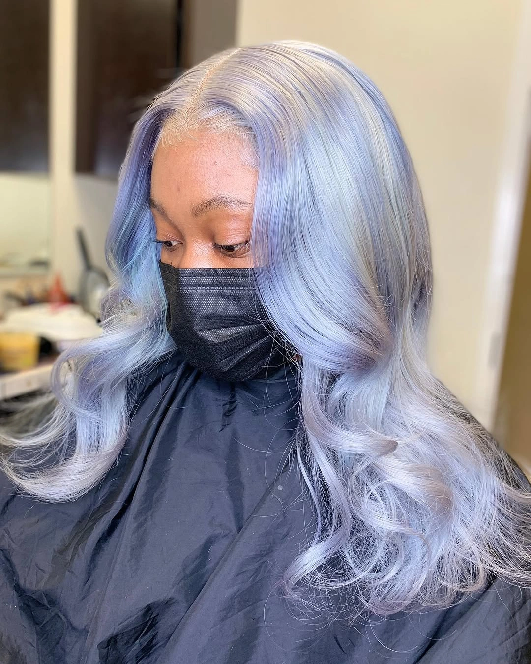 Long loose waves colored icy blue silvery periwinkle and pale lilac