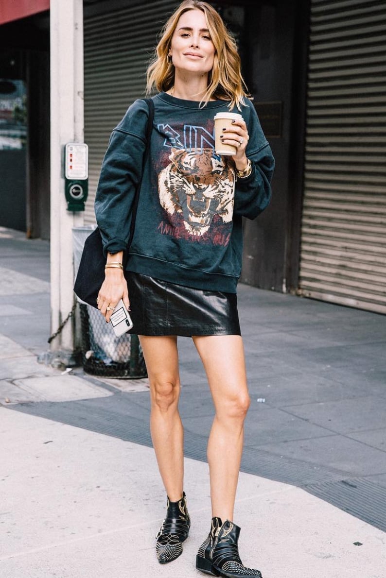 Graphic Sweatshirt Over Leather Mini Skirt Graphic Sweatshirt Over Leather Mini Skirt — Edgy Outfits