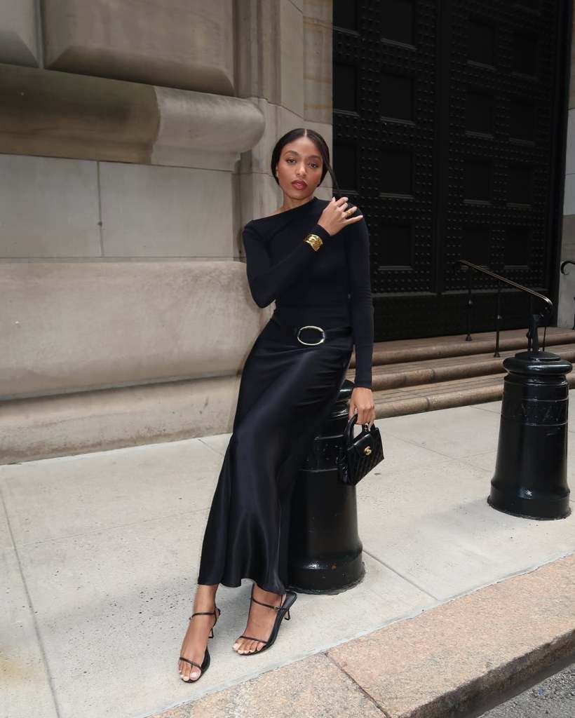 Black satin skirt with long sleeve top and gold cuff — Elegant Black Satin Skirt Outfit