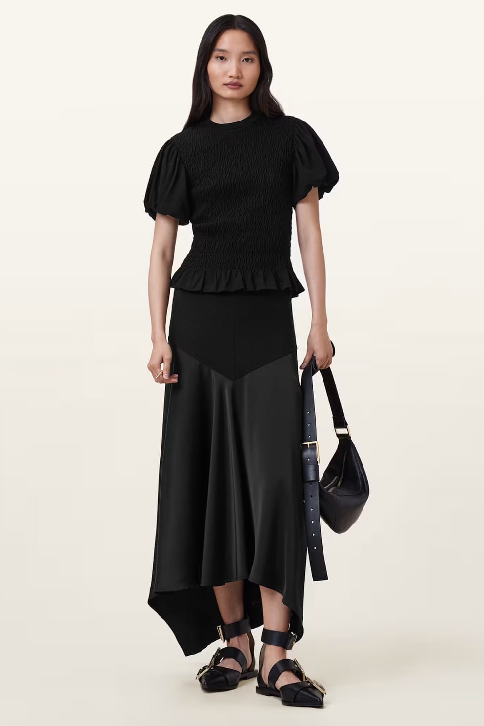 Black satin midi skirt with asymmetric hem and smocked top — Elegant Black Satin Skirt Outfit