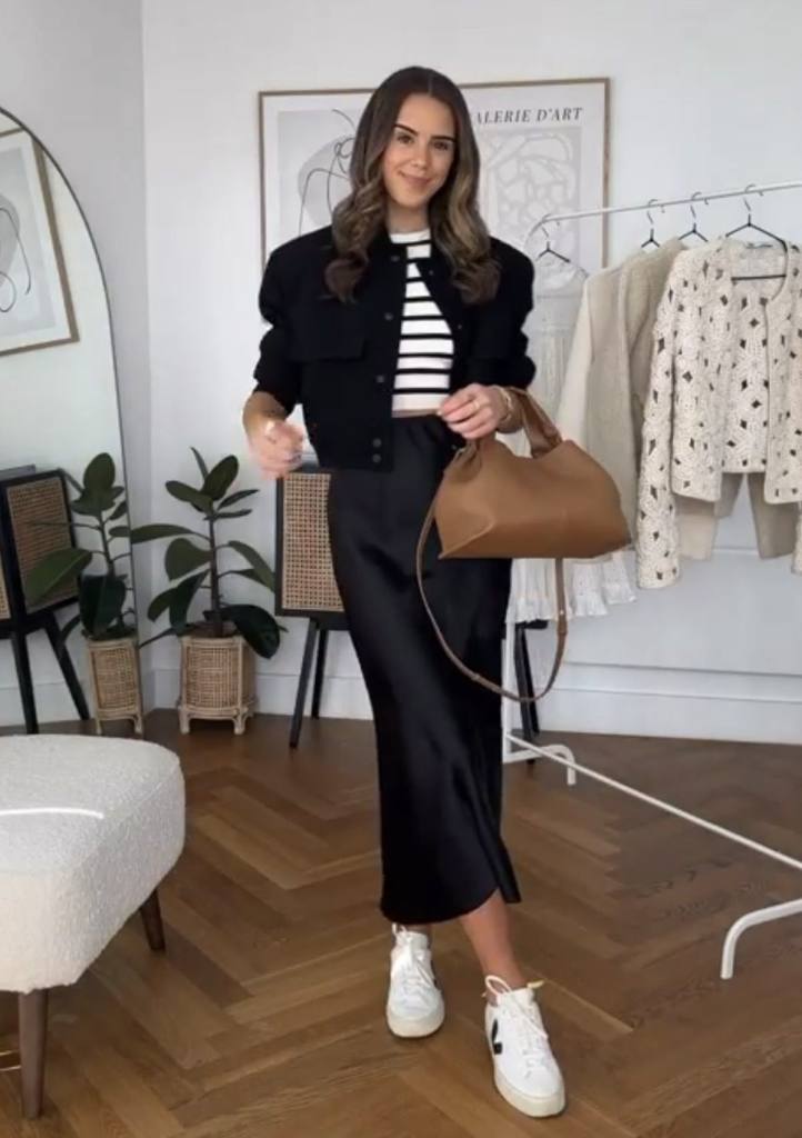 Black satin slip skirt with lace trim and white cropped jacket — Elegant Black Satin Skirt Outfit