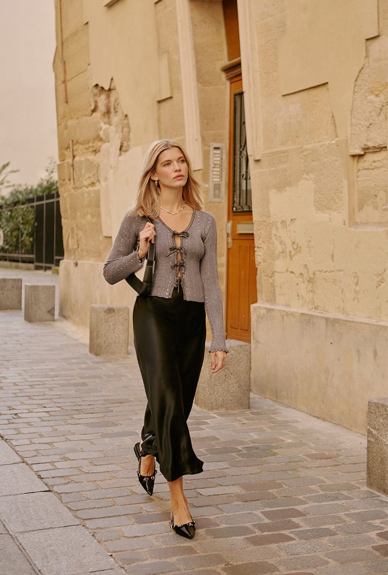 Black satin midi skirt with embellished knit cardigan — Elegant Black Satin Skirt Outfit