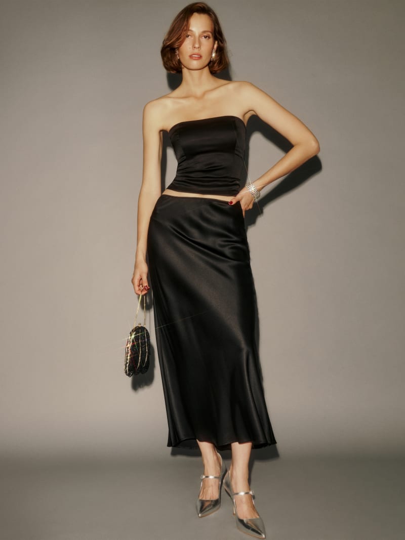 Flowing black satin midi skirt with strapless top — Elegant Black Satin Skirt Outfit