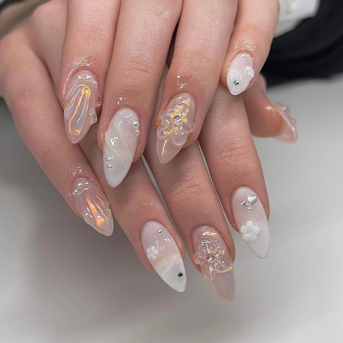 Medium Almond Milky Nude With 3D Flowers And Pearls Medium Almond Milky Nude With 3D Flowers And Pearls — Elegant Korean Nail Art