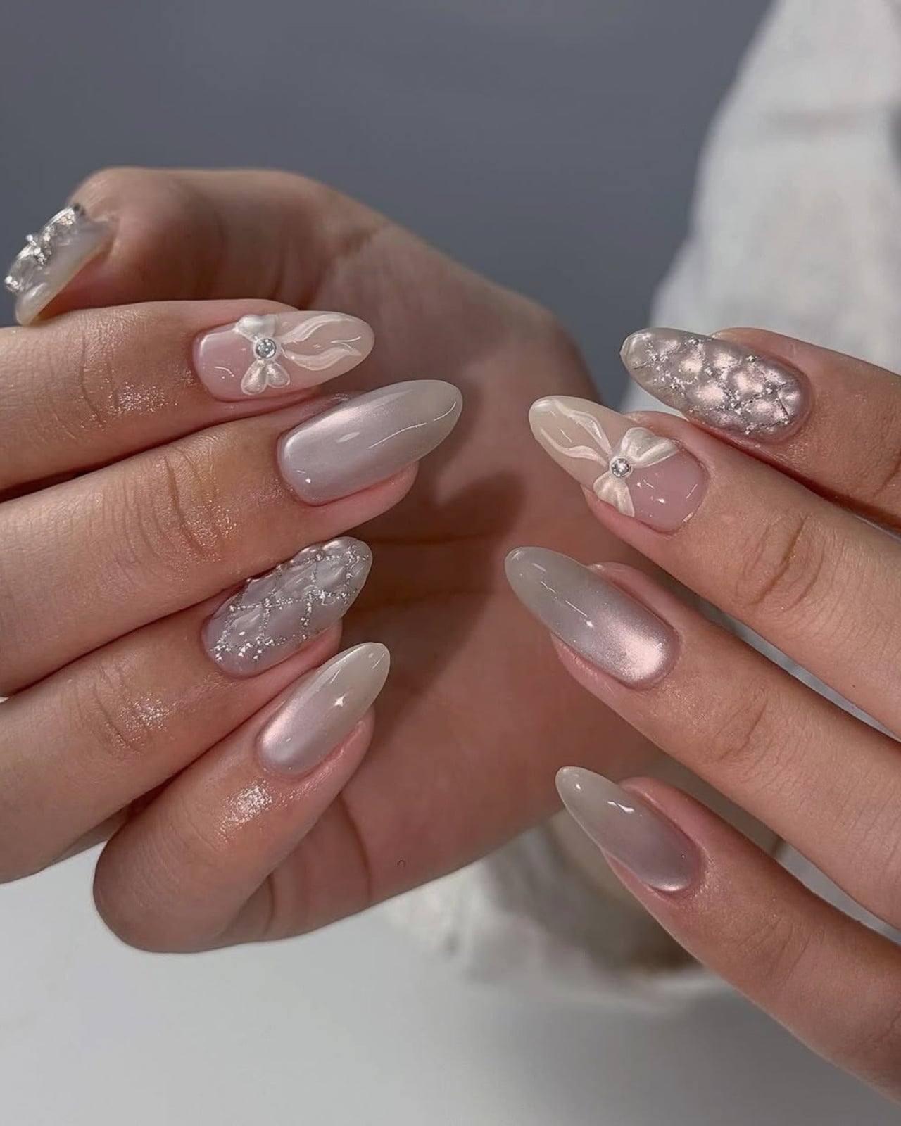 Long Oval Pearlescent Taupe Gray With 3D Flowers Long Oval Pearlescent Taupe Gray With 3D Flowers — Elegant Korean Nail Art