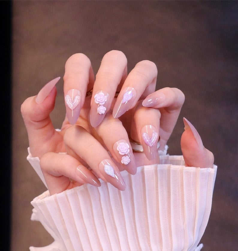 Long Sharp Almond Nude With 3D Roses And Hearts Long Sharp Almond Nude With 3D Roses And Hearts — Elegant Korean Nail Art