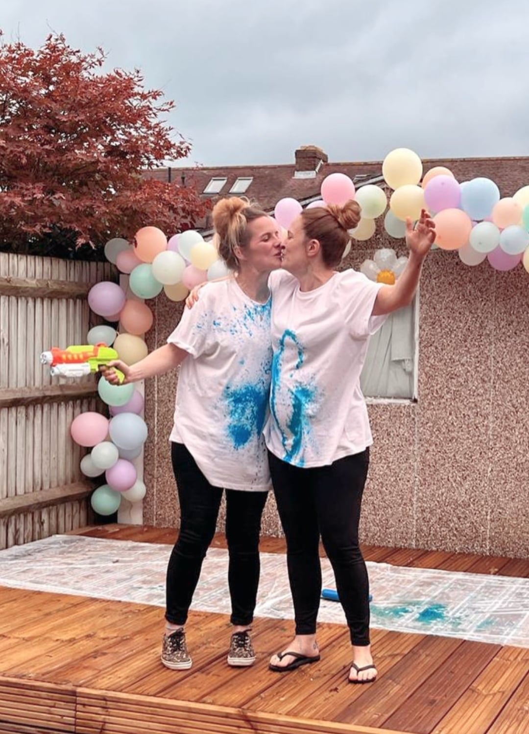 White T-Shirts with Blue Paint Splatters — Gender Reveal Outfits