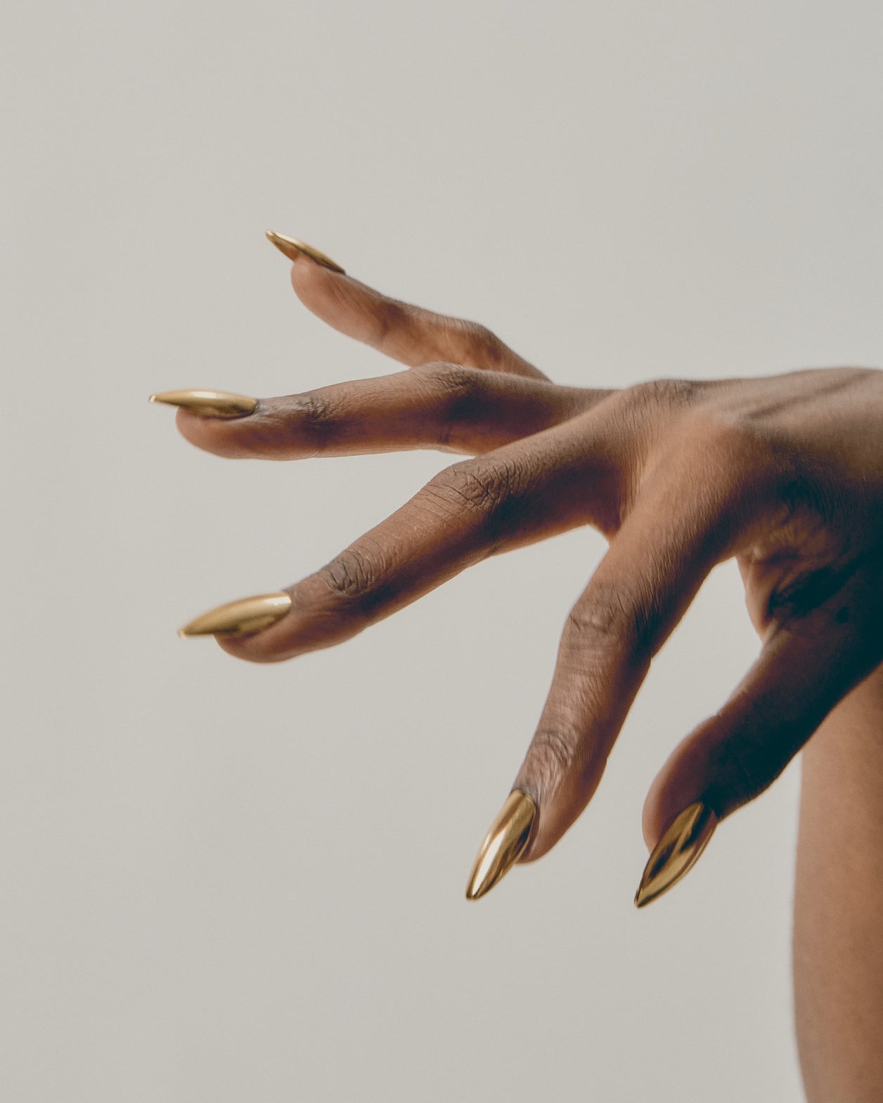 Long Stiletto Full Gold Chrome Nails