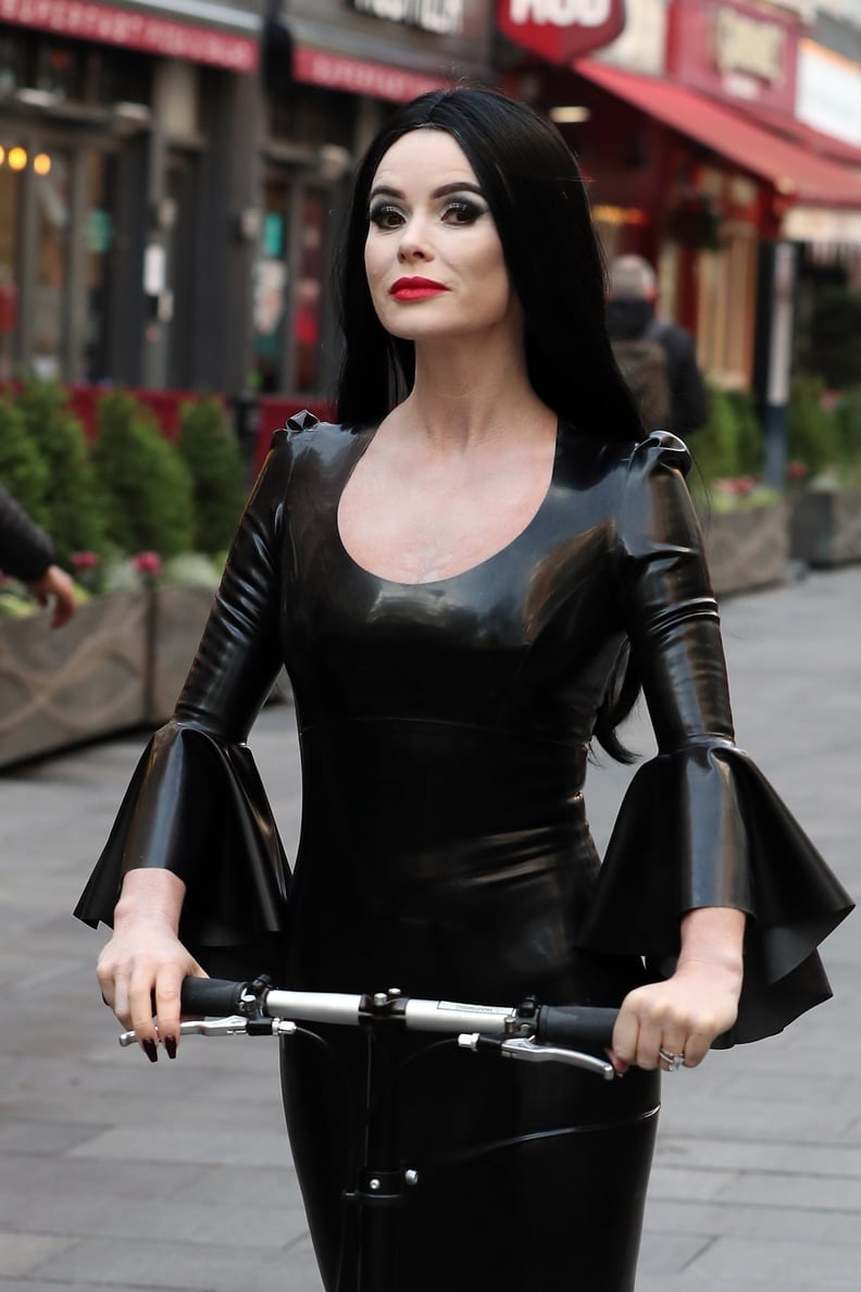 Fitted black latex dress with dramatic bell sleeves — Gothic Style