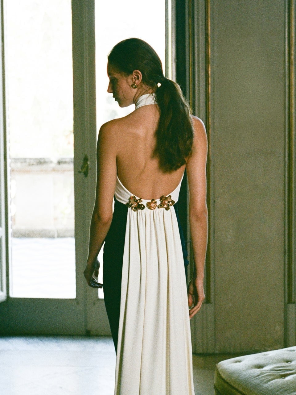 Black and white halter neck gown with gold embellishment — Gowns Dresses