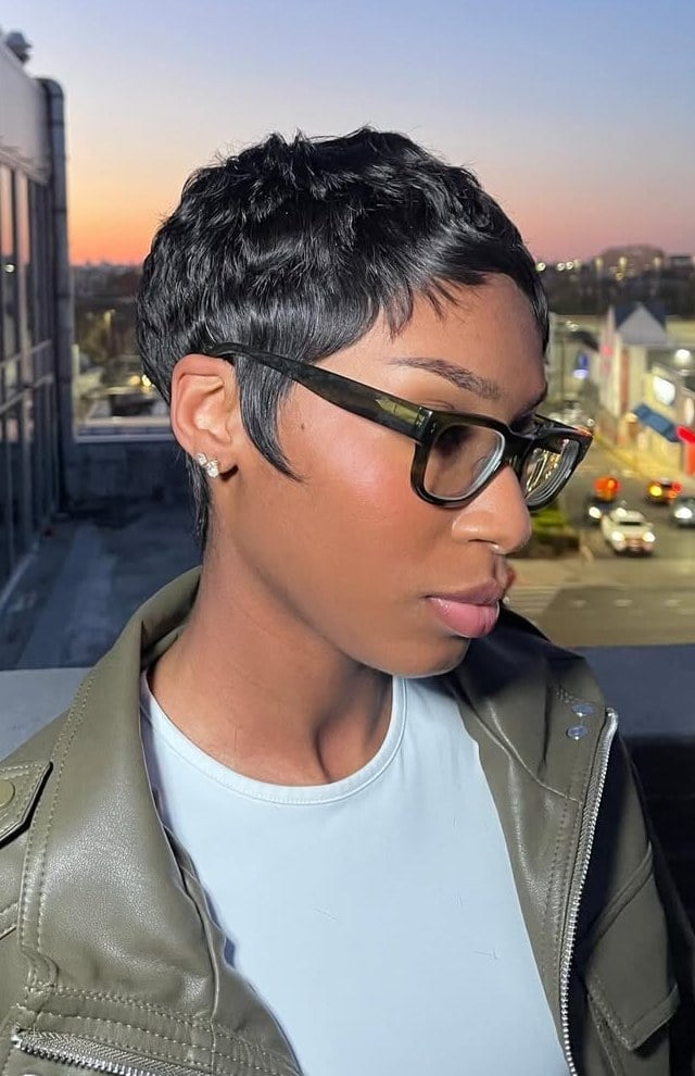 Sleek Black Pixie With Side Bangs, Ear — Haircuts for Black Women