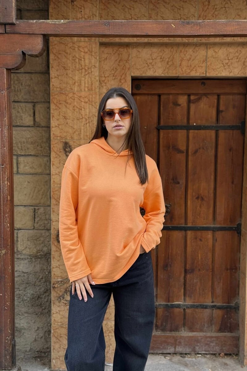 Bright Orange Hoodie with Dark Gray Wide-Leg Pants — Hoodie Outfits Women