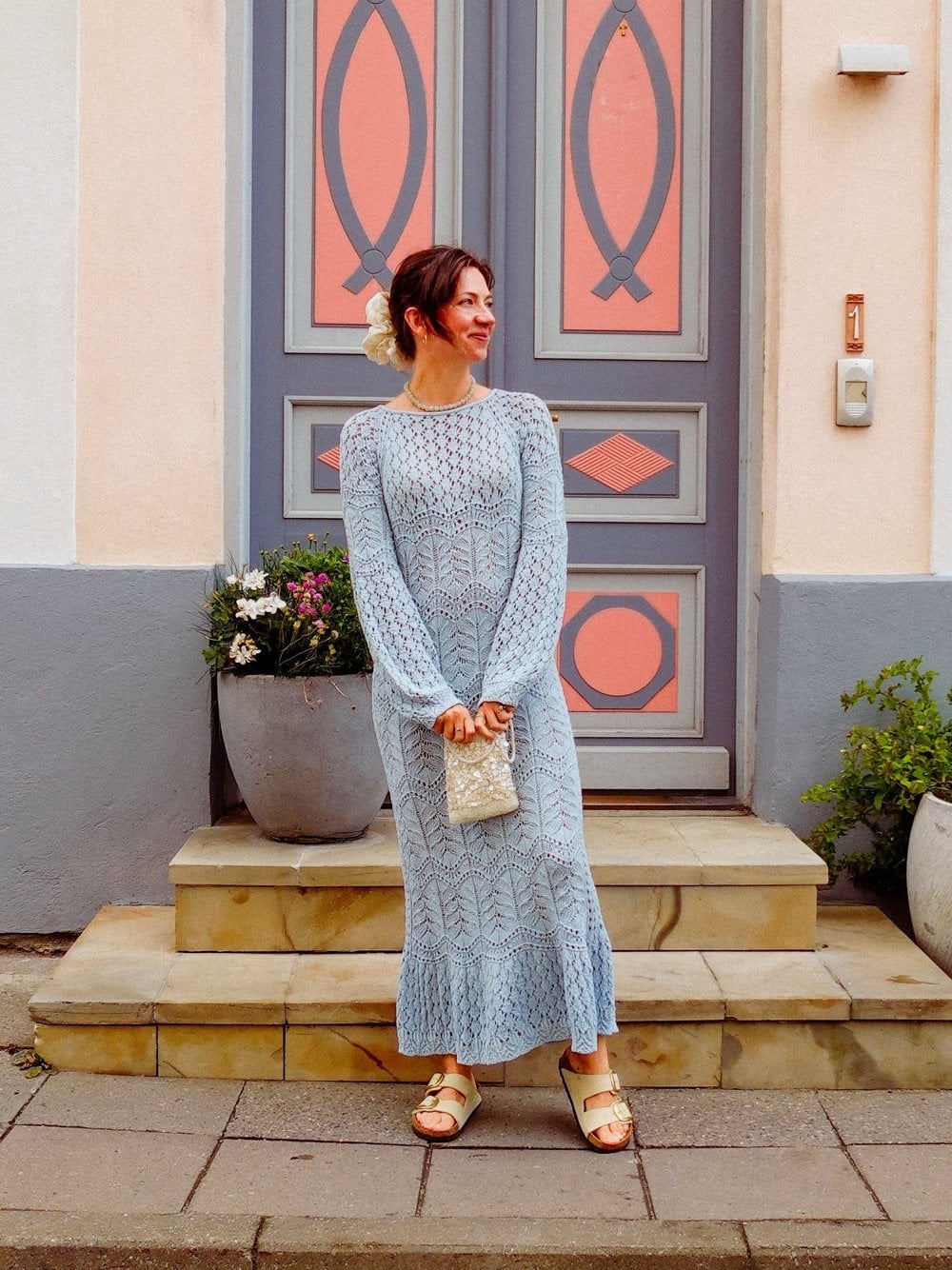 Light blue open knit maxi dress with beaded clutch — Knitted Dresses