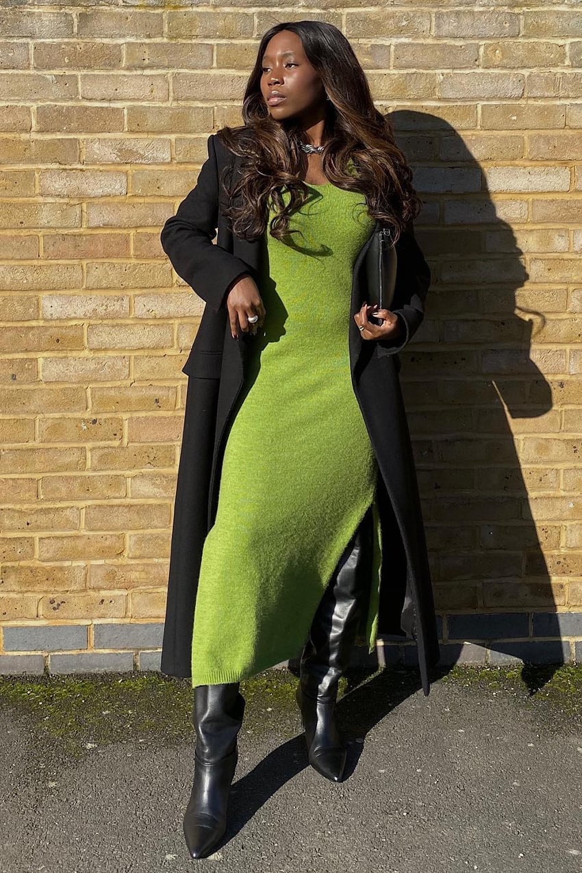Lime green knit dress with high slit under black coat — Knitted Dresses