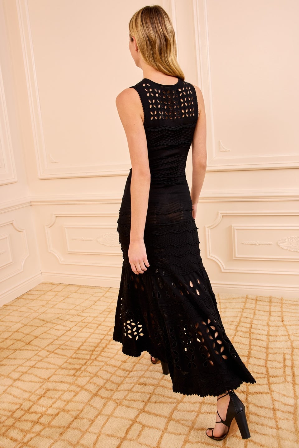 Black sleeveless knit dress with laser-cut tiered skirt — Knitted Dresses