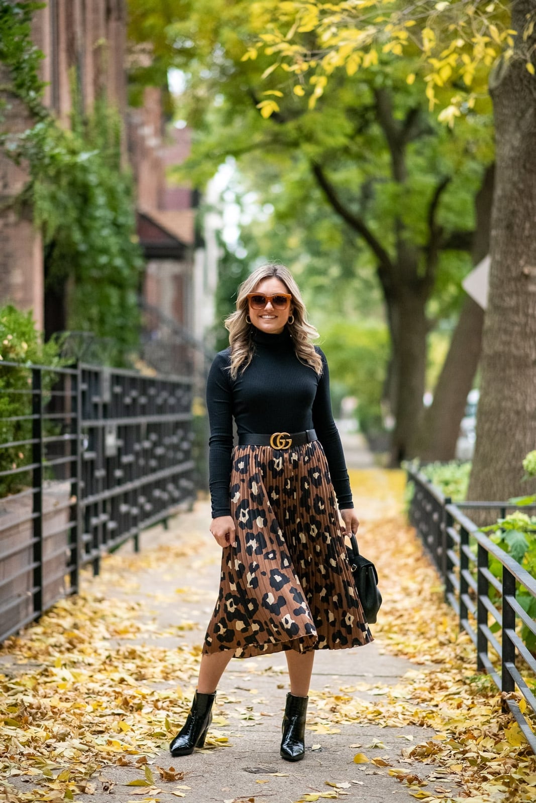 Pleated Leopard Skirt with a Black Turtleneck — Leopard Outfits