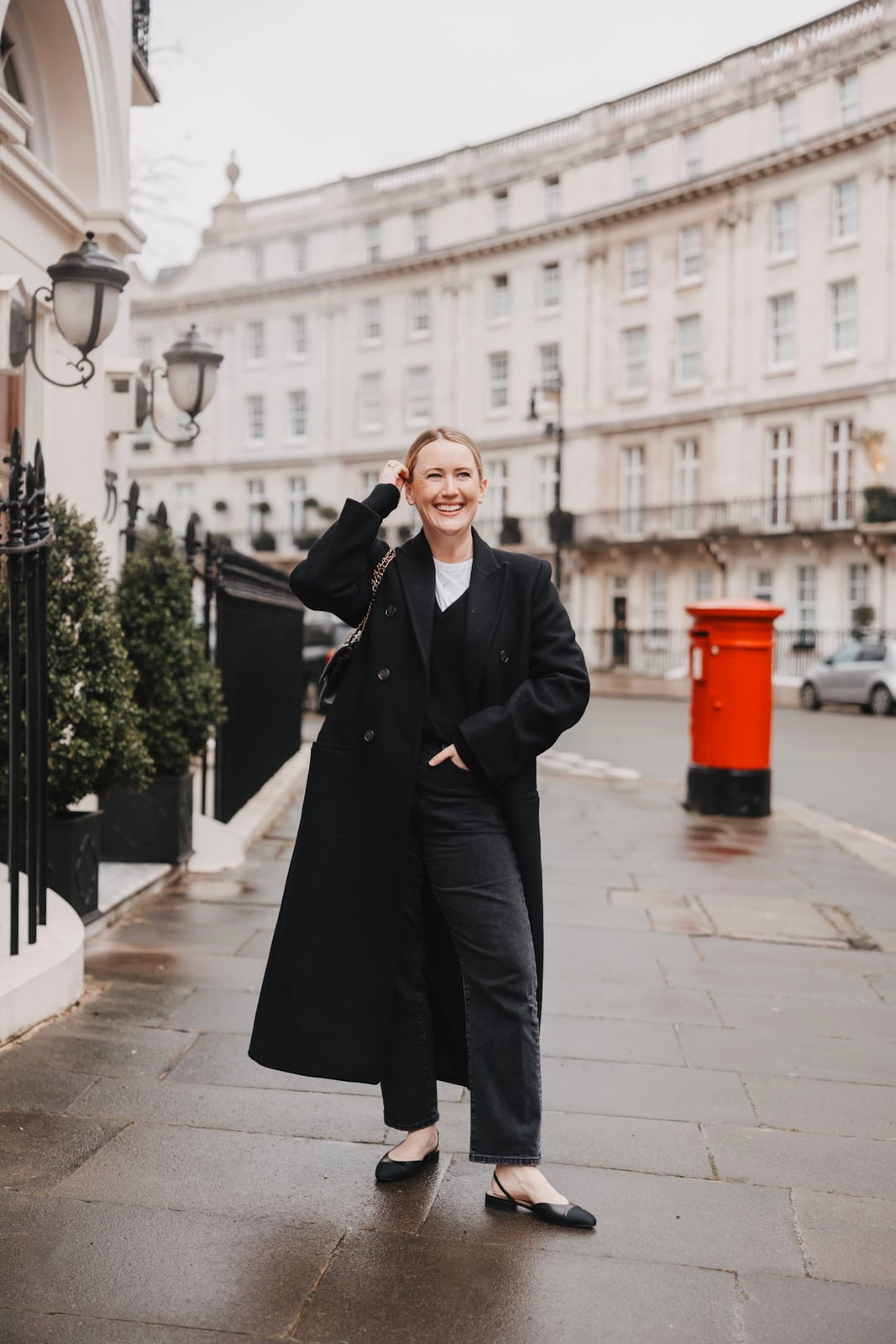 Long Black Wool Coat Over Casual Layers — London Outfits