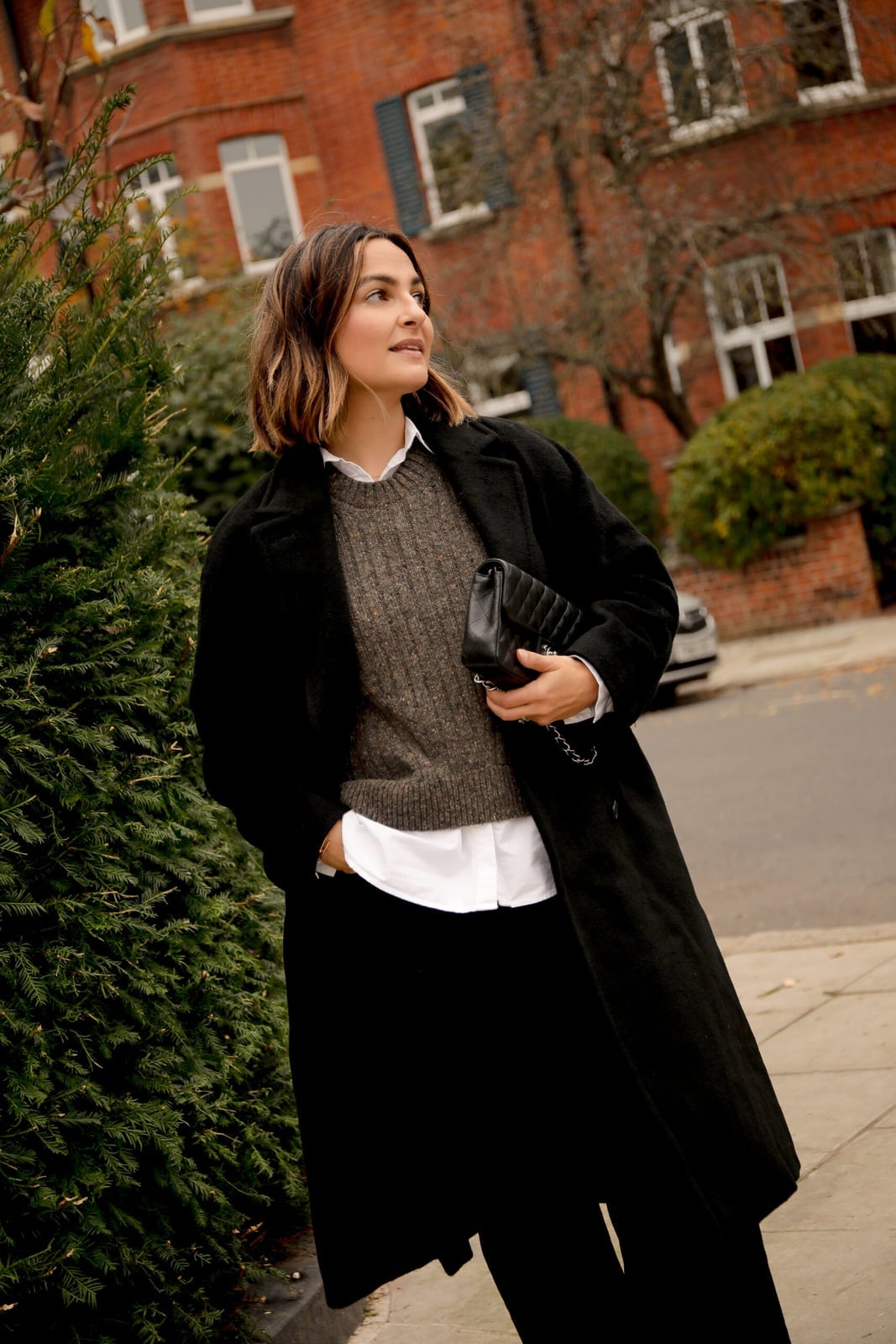 Black Coat Over Textured Knitwear — London Outfits