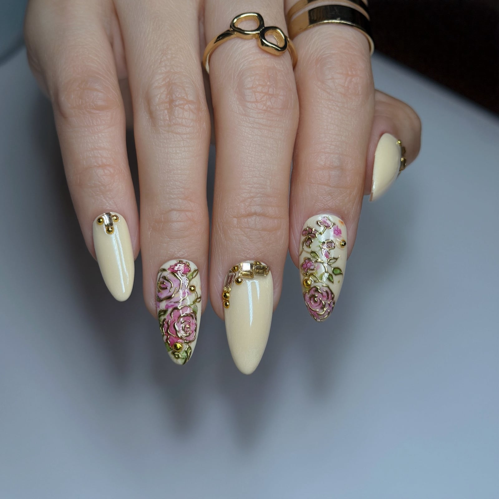 Creamy Glossy With Floral Designs — Medium Almond Nails