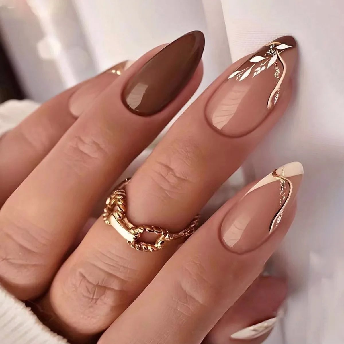 Brown Abstract Lines Gold Leaf Accents — Medium Almond Nails