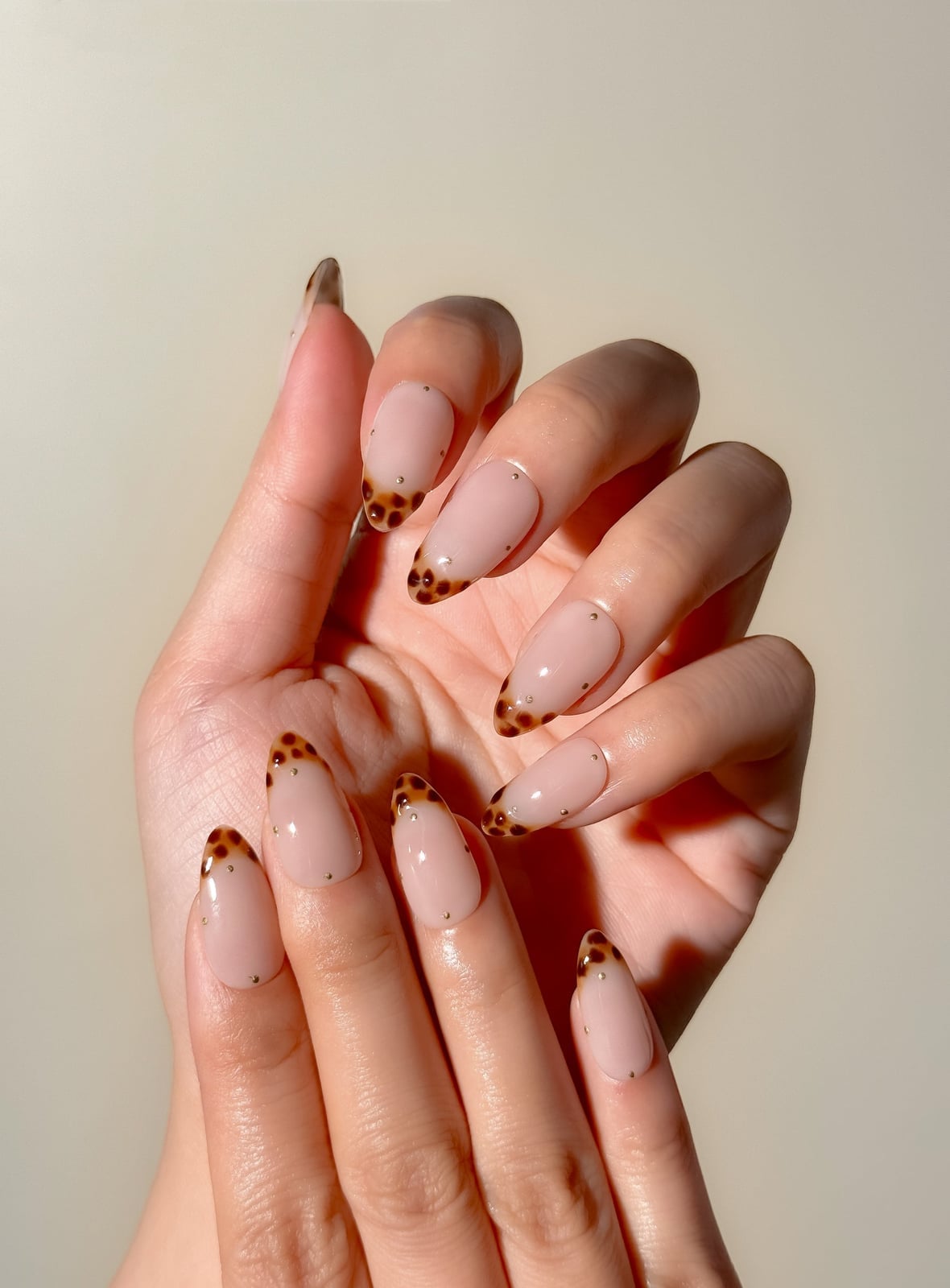 Nude With Tortoiseshell French Gold Dots — Medium Almond Nails