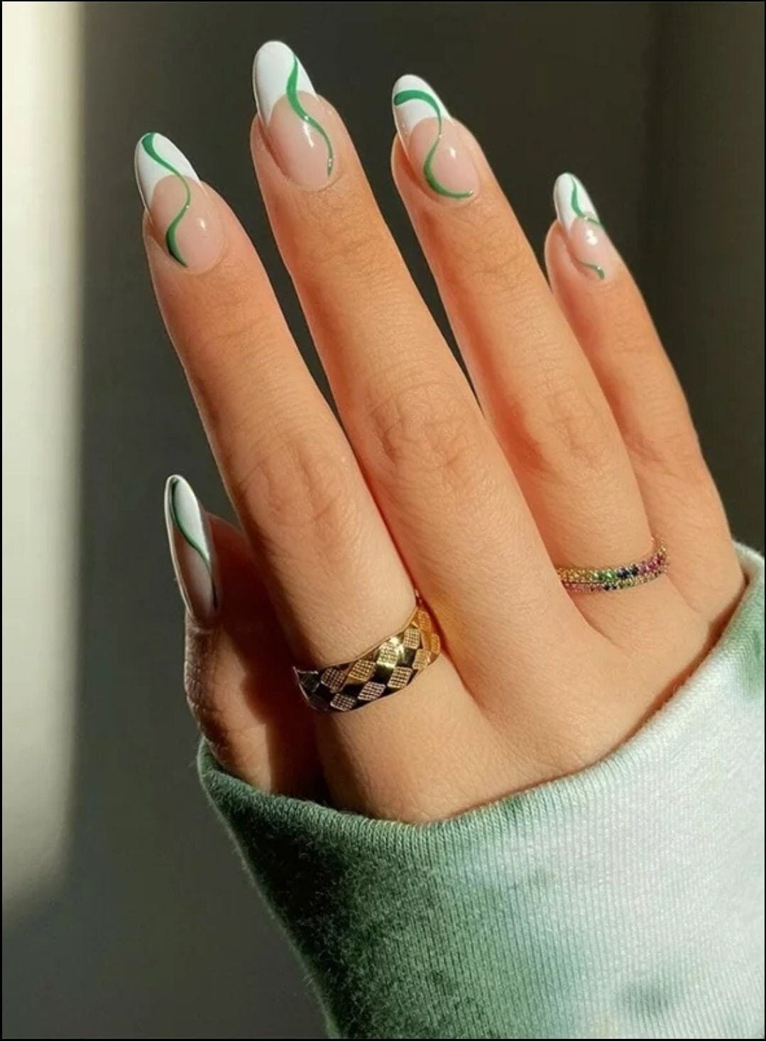 Milky White With Abstract Green Lines — Medium Almond Nails
