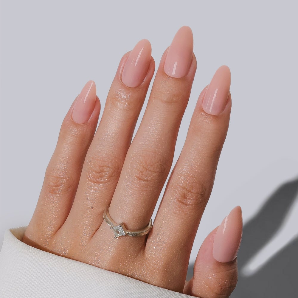 Sheer Milky Nude Glossy Finish — Medium Almond Nails