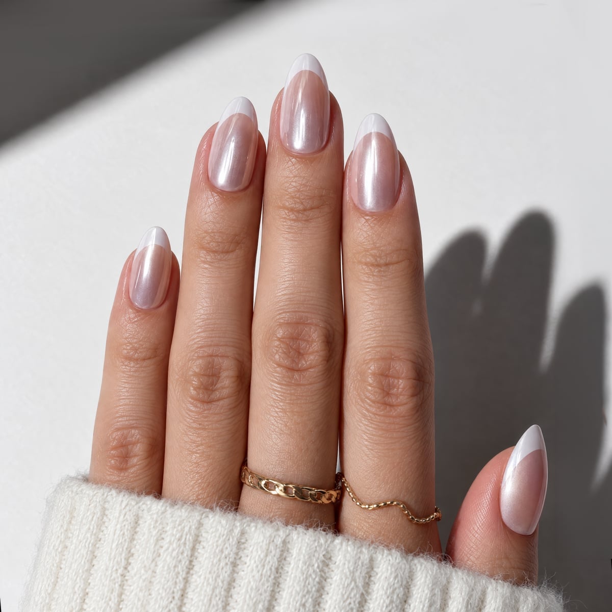 Shimmering Milky Pink French — Medium Almond Nails