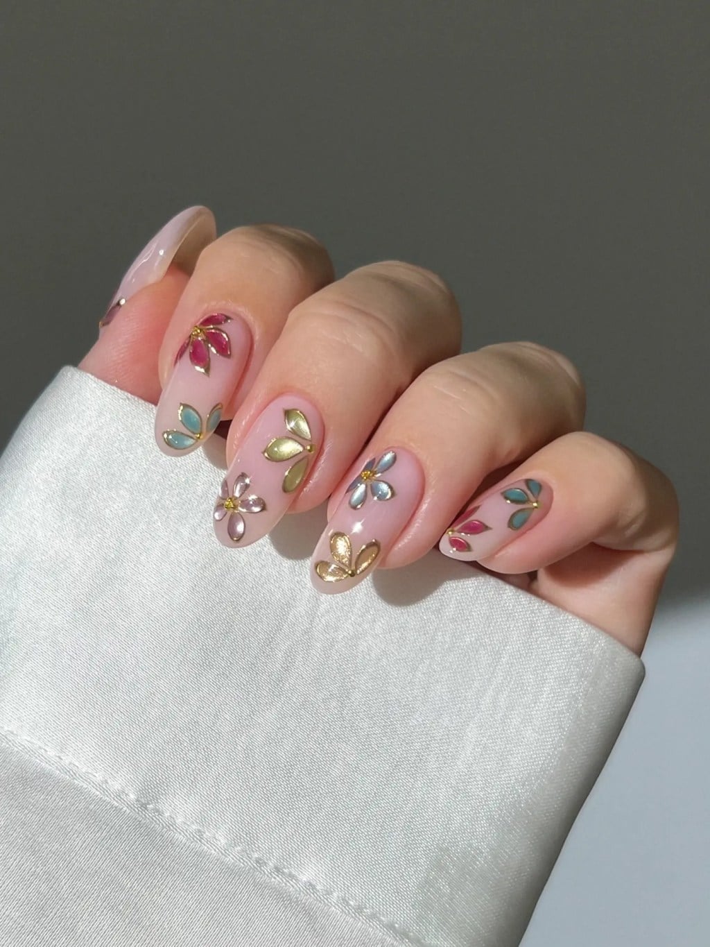 Nude With 3D Floral Embellishments — Medium Almond Nails