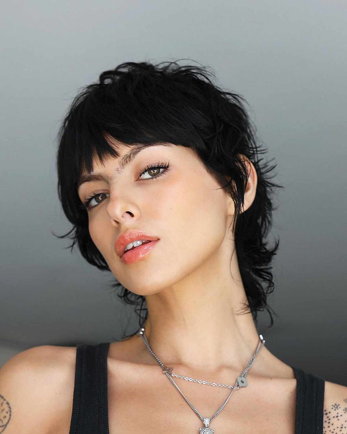 Short Black Mullet With Choppy Layers And Fringe Short Black Mullet With Choppy Layers And Fringe — Mullet Hairstyles