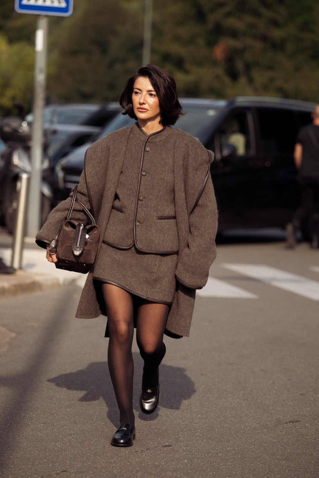 Opaque black tights with a matching mini skirt and wool coat — Outfits with Tights