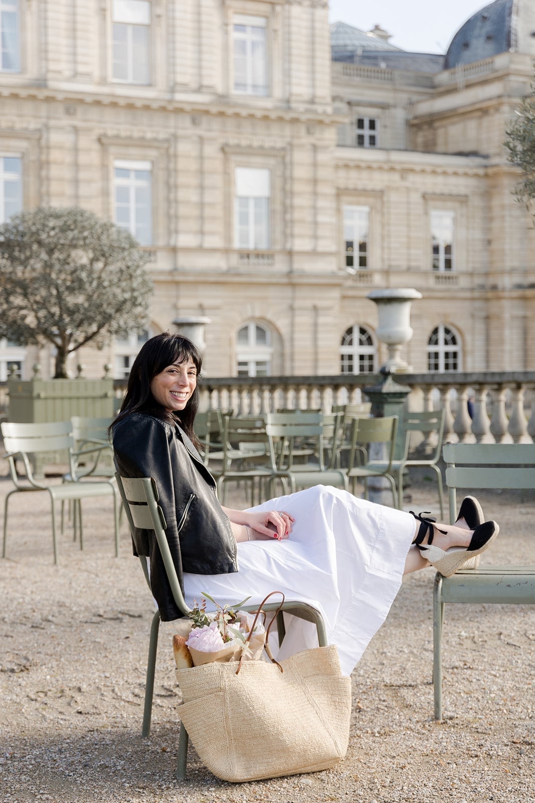 Leather jacket over a white maxi dress — Parisian Style