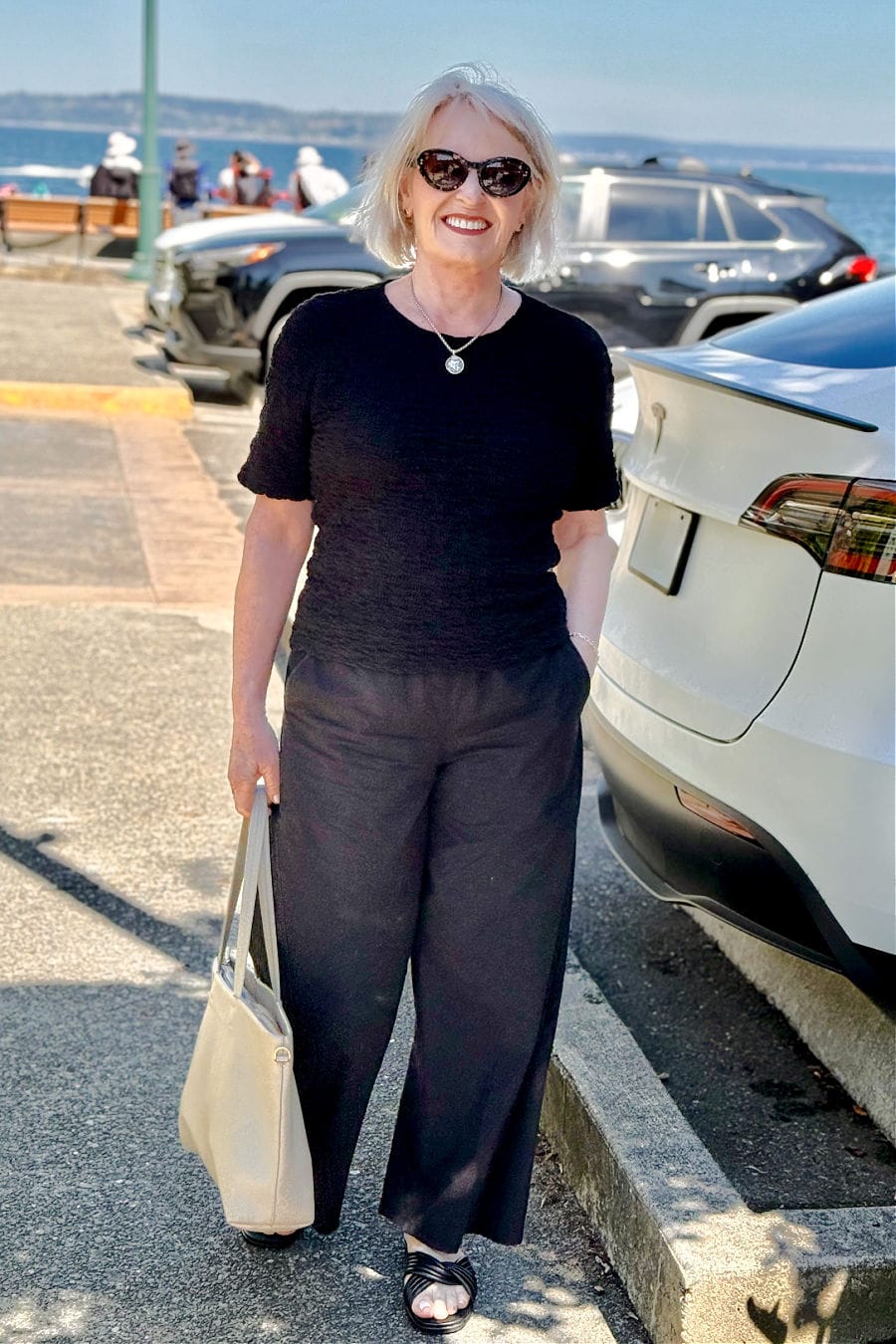 Textured black top and wide-leg trousers for casual dining Textured black top and wide-leg trousers for casual dining — Restaurant Outfit