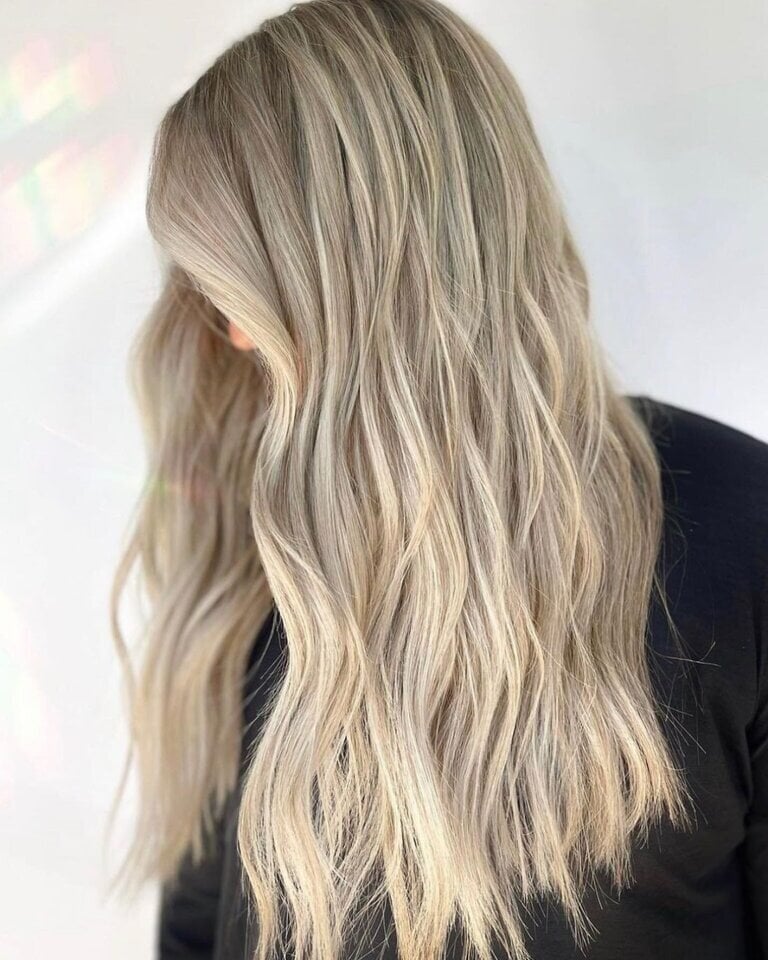 Wavy Ash Blonde Hair With Delicate Babylights and Black Top — Simple Babylights