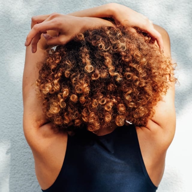 Curly Brown Hair With Caramel Babylights and Black Tank — Simple Babylights