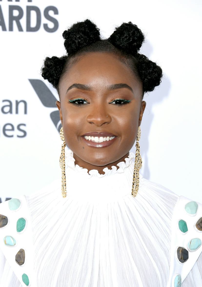 Bantu knots with an embellished white dress and chandelier earrings — Simple Bantu Knots