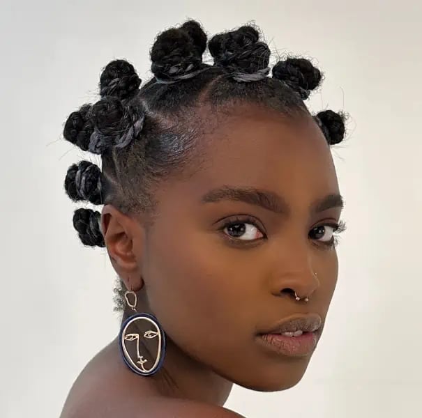 Bantu knots hairstyle with large face-shaped earrings — Simple Bantu Knots